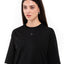 Zwarte longsleeve Minimal, op model, close-up