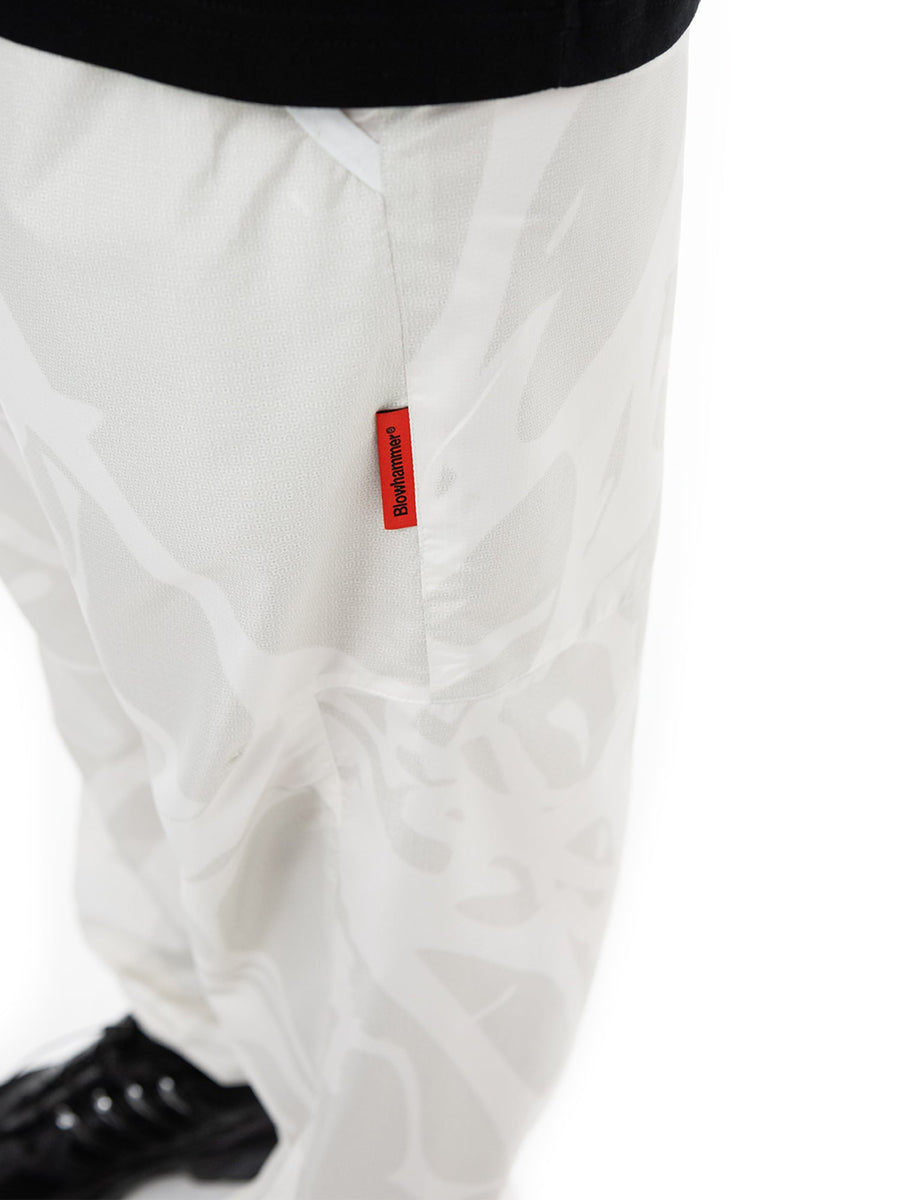 Calças jogger marfim Strand Ivory, pormenor da etiqueta