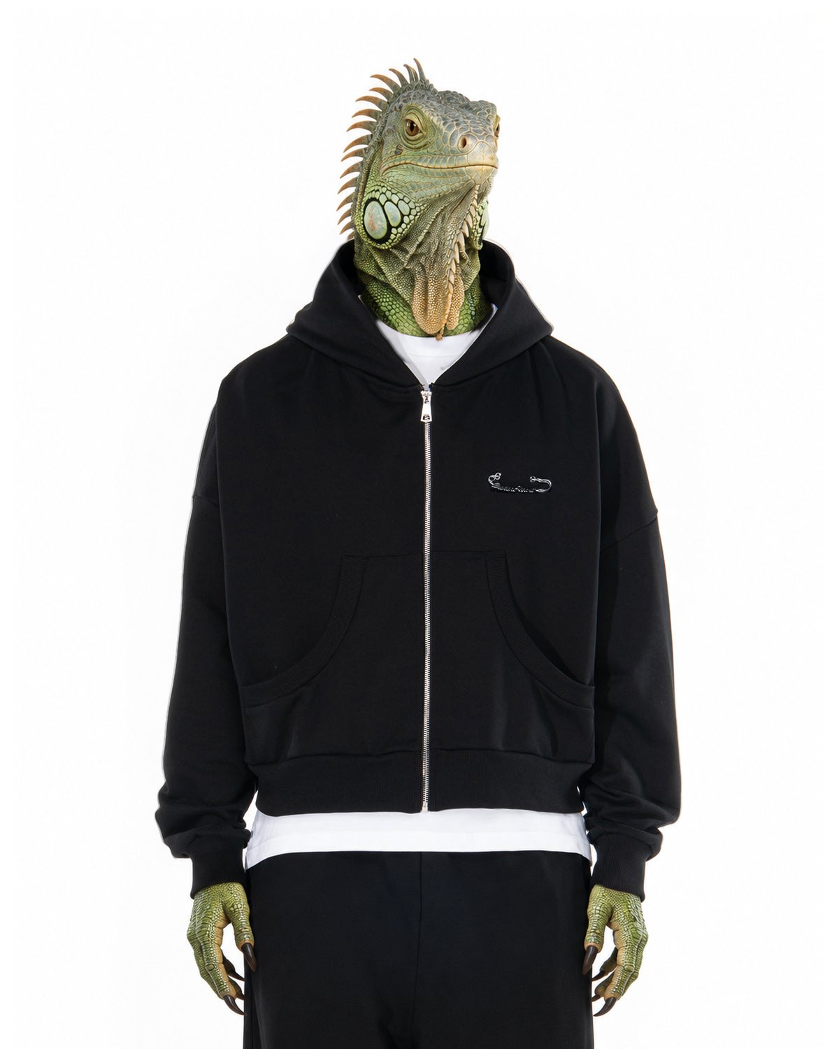 Invented character, green iguana, wearing BROKENHEART Hoodie