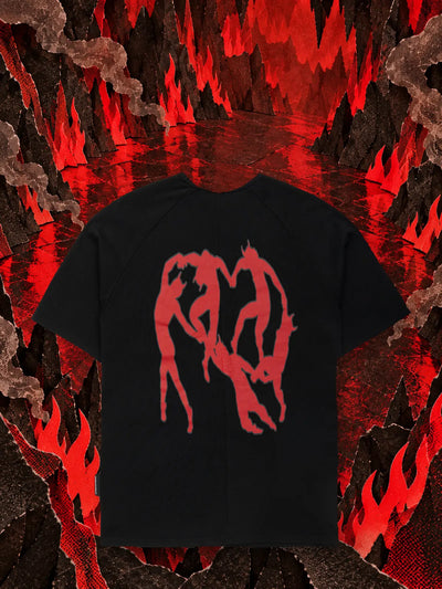 The black Infernal Groove t-shirt in a black paper cave, among red paper flames.