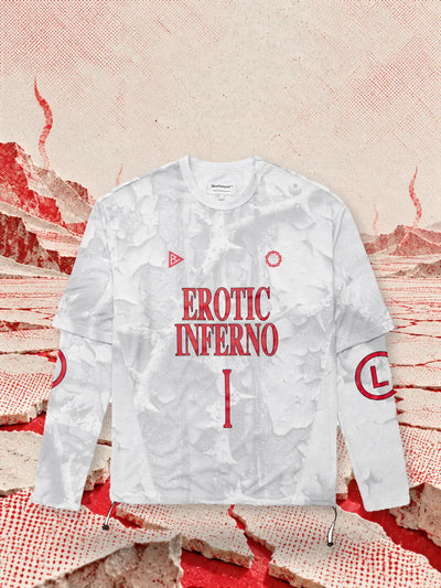 The white Inferno 1 long sleeve t-shirt in a desert of cracked white paper, with red burning in the cracks.