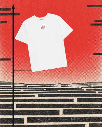 The Manifesto T-shirt in white, with the small patch and the red ribbon on the chest, tied by one side to a black pole like a flag, against a red halftone sky. Below, a plain made of rows of black bars on pale paper, and more black bars floating in the sky.