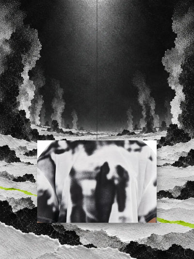 A piece of the print from the cropped white and black Rift t-shirt, hanging on a thread over paper snow, among columns of black smoke.