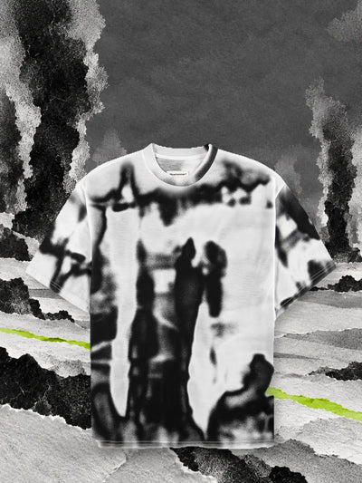 The white and black Rift t-shirt on paper snow, among columns of black smoke and a lime green line.